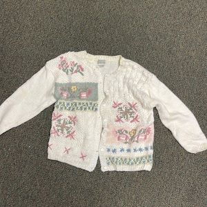 Woman’s cardigan sweater.  Size large.  Gently used